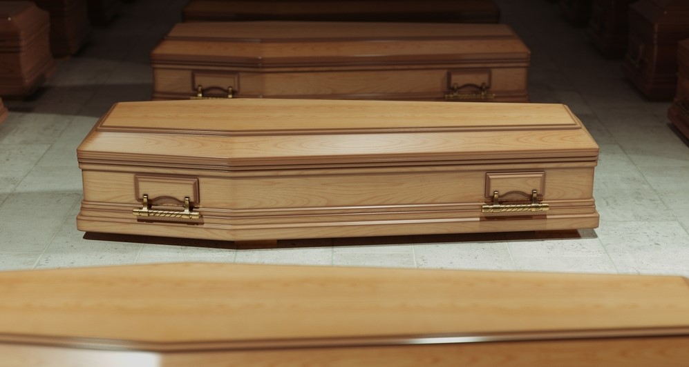 A row of wooden coffins