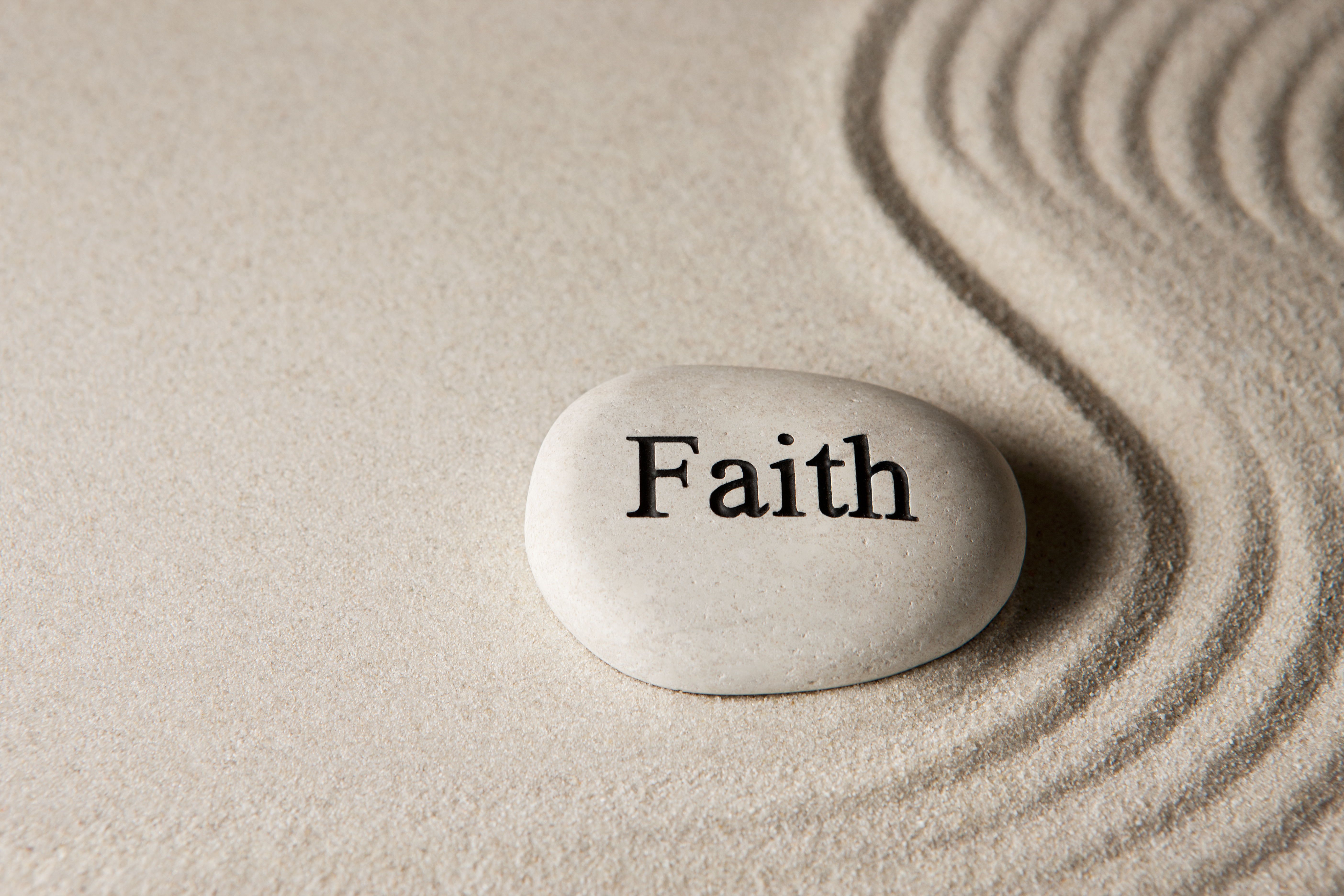 stone has faith written on it