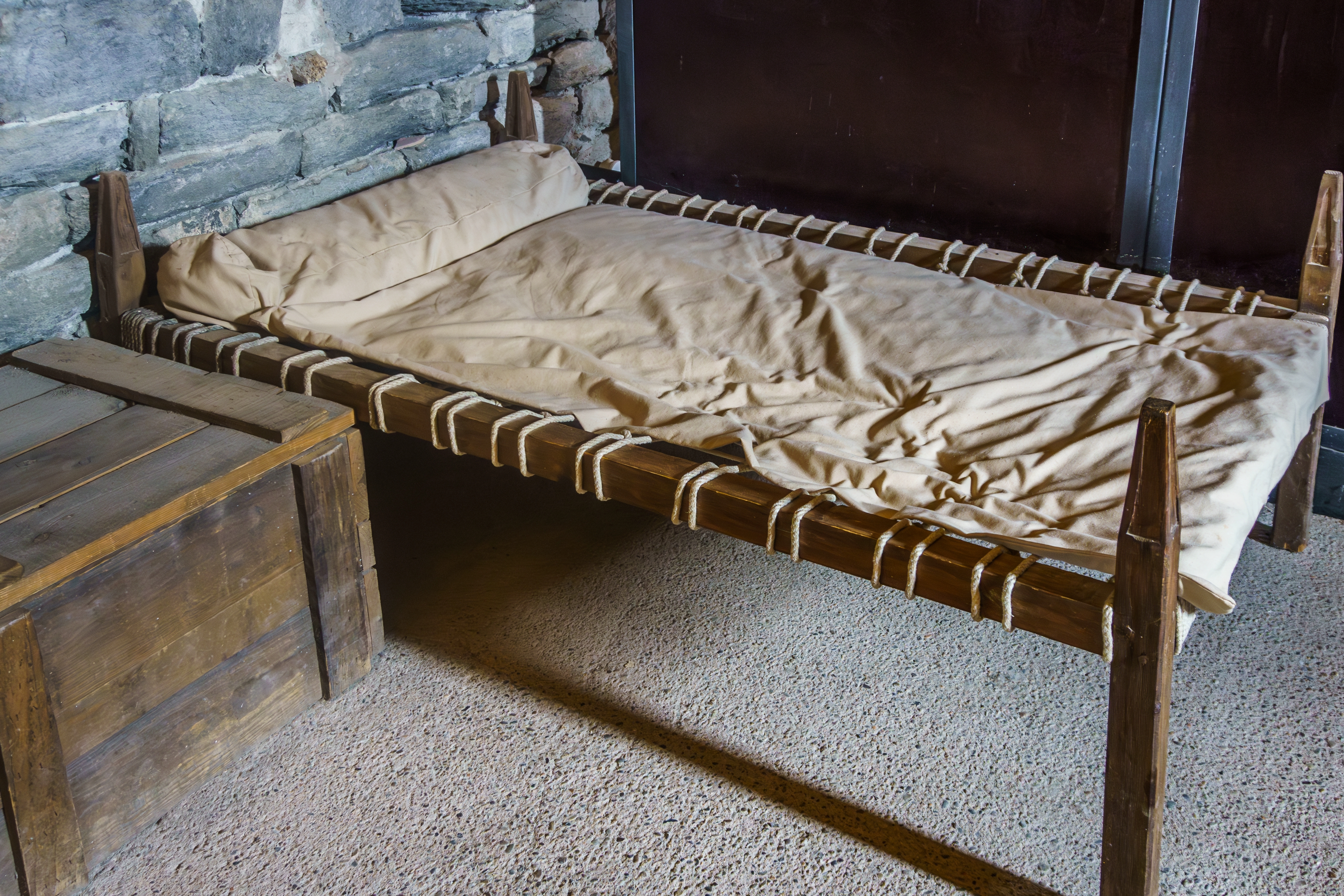 A very old bed with desk